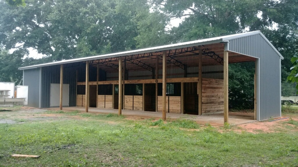 Metal Structure With Aminal Stalls Open Front